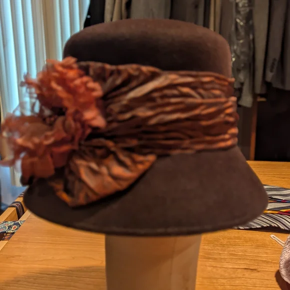 Elegant Brown Hat with Floral Accent